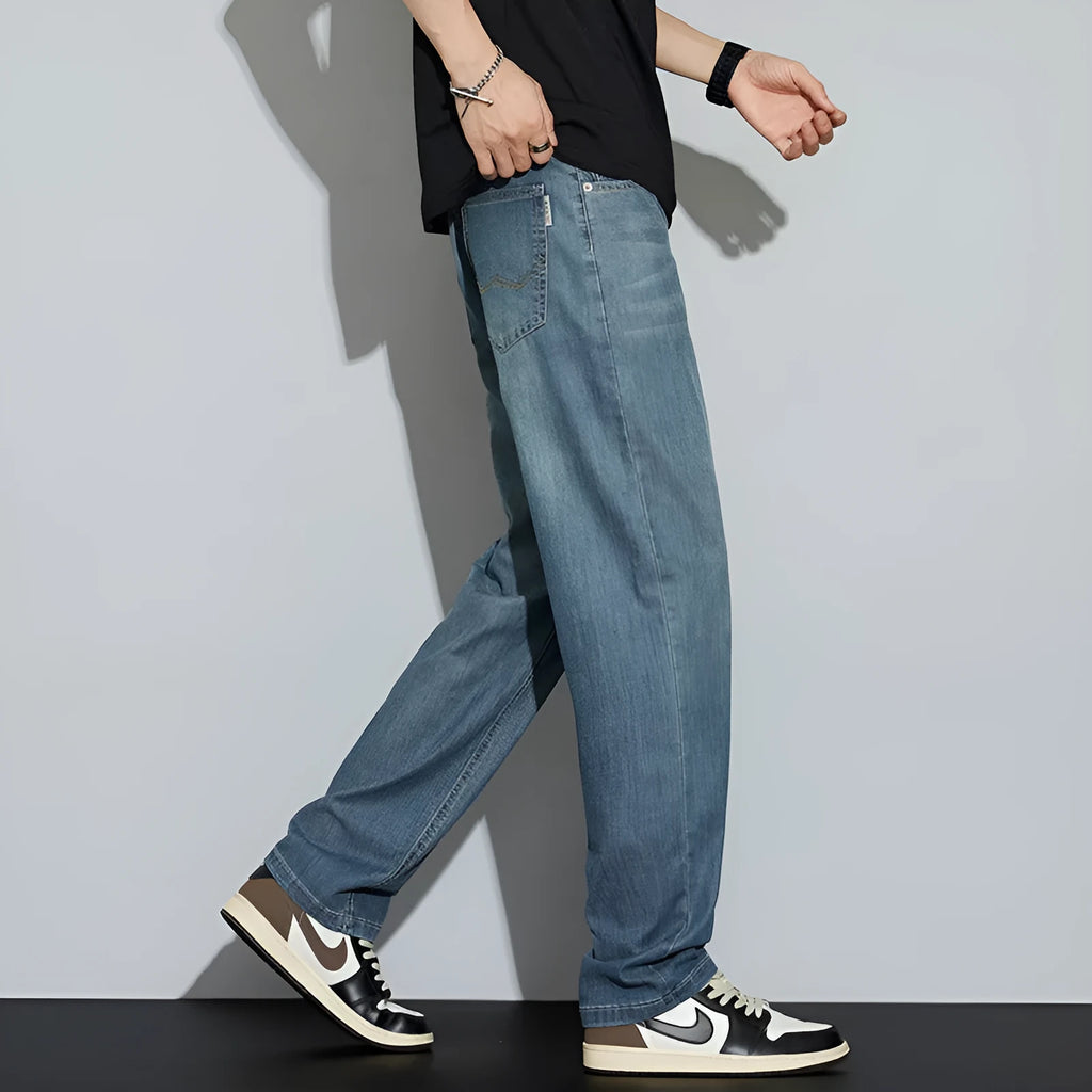 Cool-feeling ice silk jeans for men in vintage blue, denim fabric with slight stretch