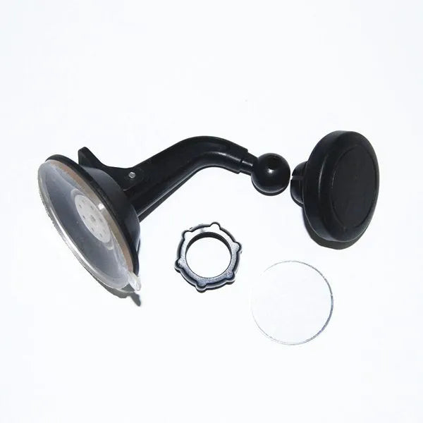 Black magnetic car phone holder mounted on dashboard with smartphone attached showing 360-degree rotation feature