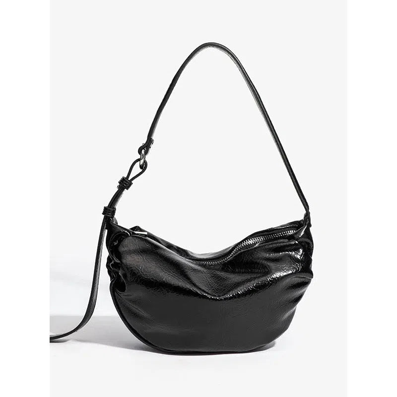 Black pleated dumpling-shaped PU shoulder bag with three-dimensional outer pocket and rock-and-roll style