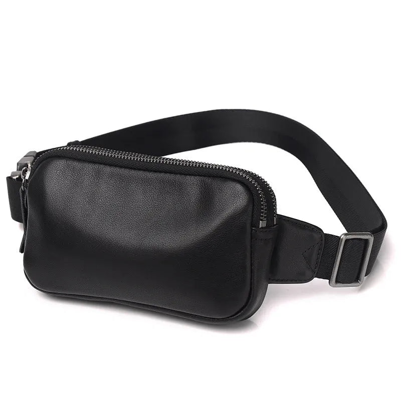 Small black cowhide leather crossbody bag for men with nylon lining.