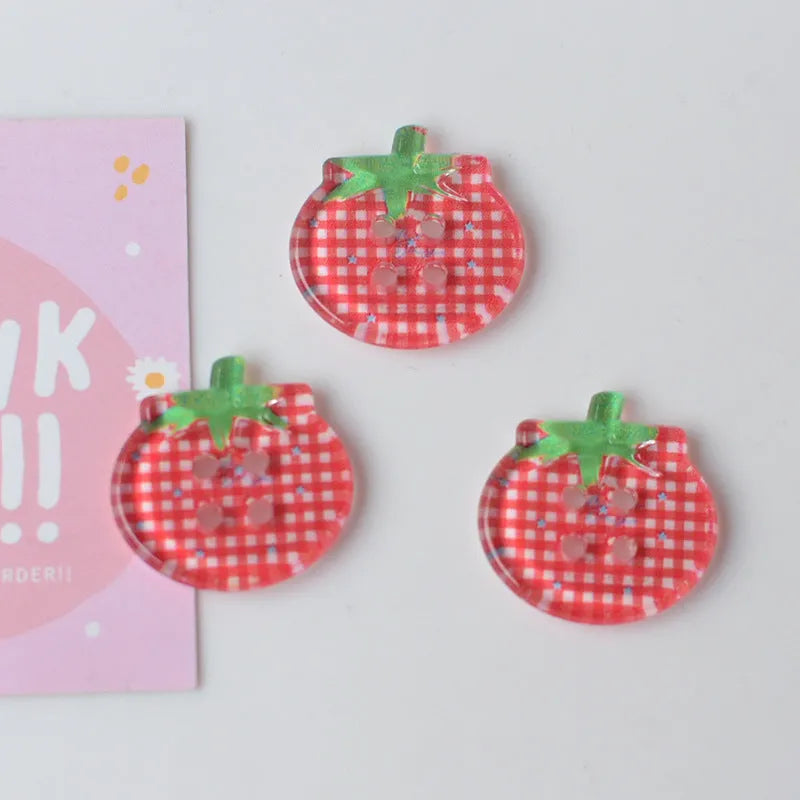 Medium tomato-themed plastic buttons in red colour variations including cherry tomato printing and solid red