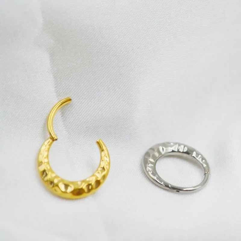 Titanium alloy concave-convex nose ring with carved surface in gold or silver colour, showing 1.2x8mm and 1.2x10mm size options