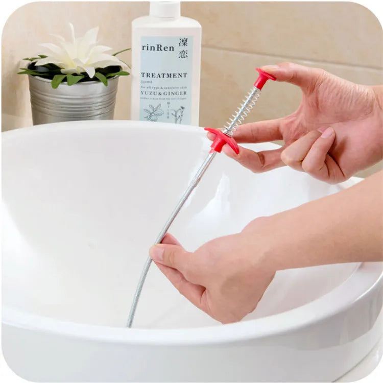 Flexible 60cm long sewer dredger spring cleaning tool with a grip handle for unblocking sink drains.