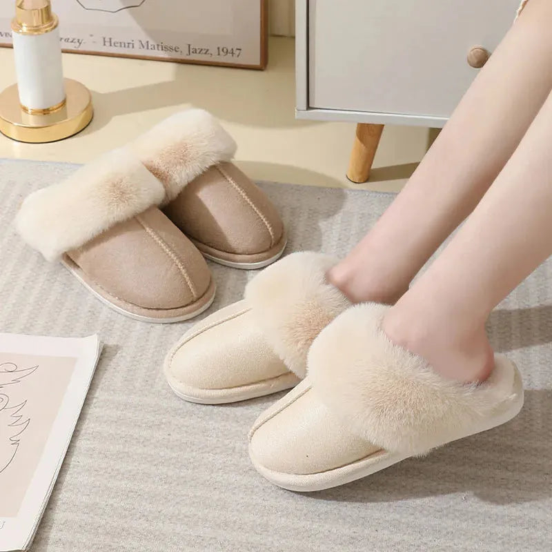 Women's brown plush indoor slippers with a round toe, flat heel, and a textured PVC sole.