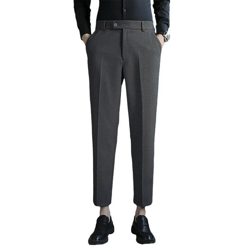 Men's straight cut brown corduroy trousers with elastic waistband shown front and side view