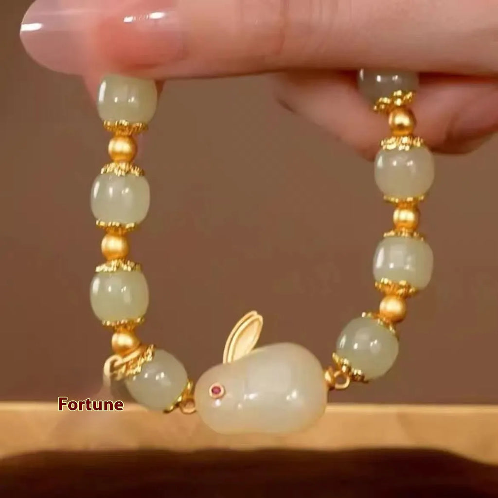 Green electroplated Jade Hare bracelet for women with Chinese style zodiac design and lily elements
