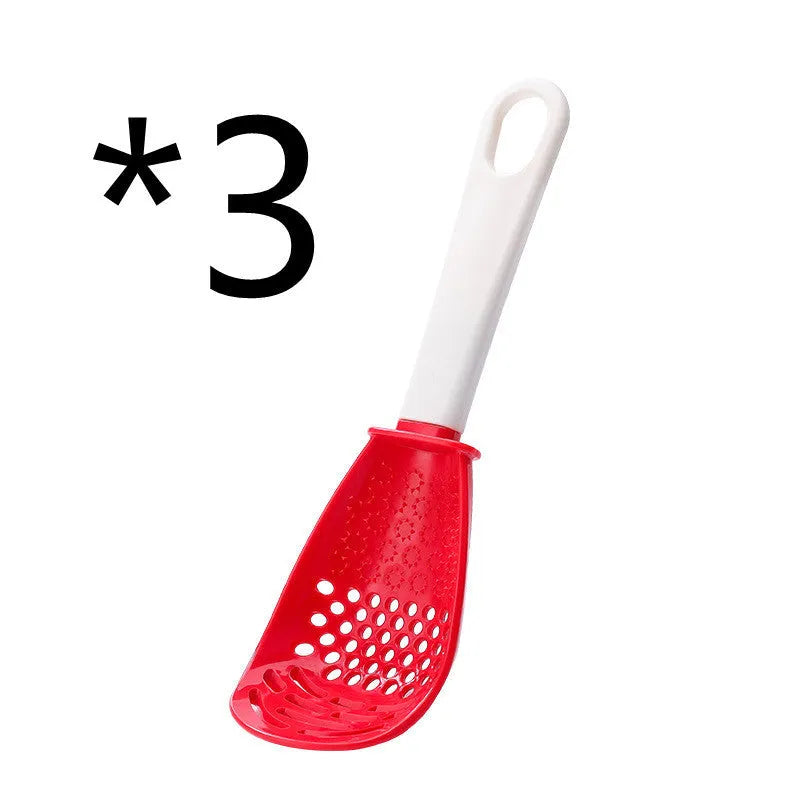 Red and black plastic multifunctional slotted cooking spoon with serrated edges for mashing and grinding.