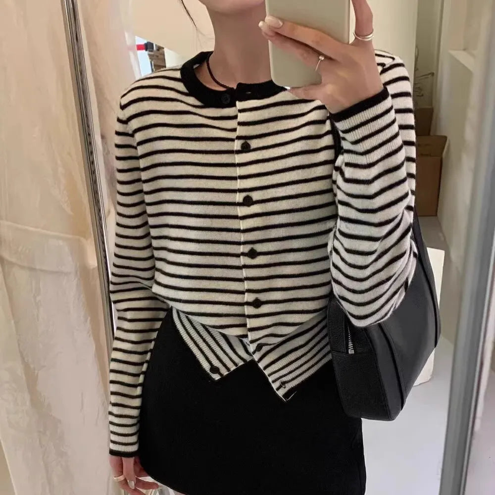 Dark grey and white striped women's cardigan coat with long sleeves and a slim, short fit.