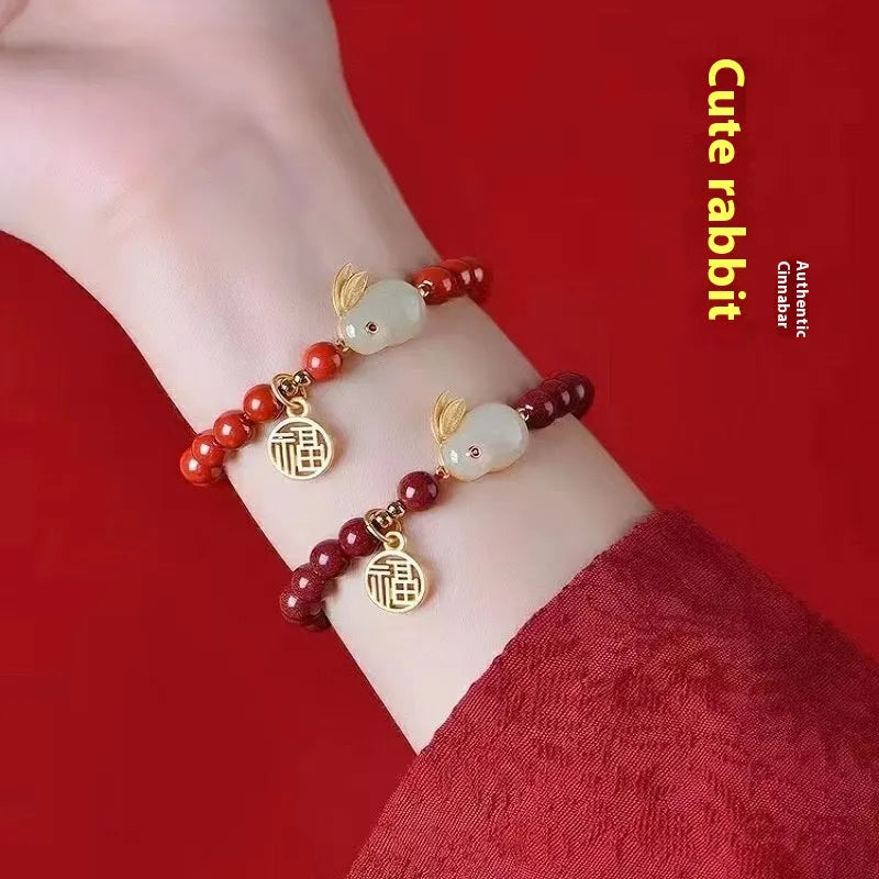 Purple gold sand cinnabar bracelet with jade hare charm in 6mm and 8mm bead sizes