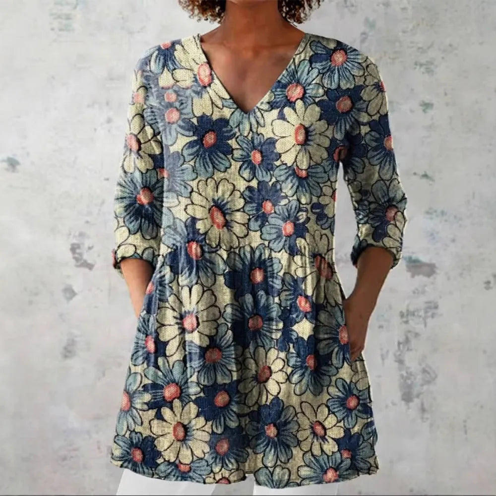 Women's retro patterned long-sleeved top with V-neck on a hanger