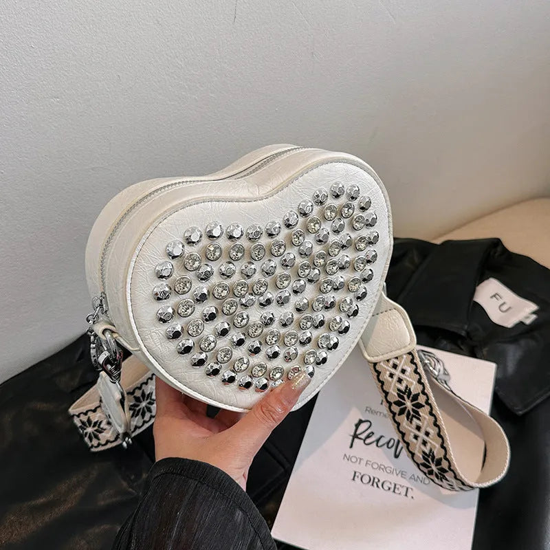 Heart shaped PU crossbody phone bag with western style shoulder strap in black