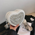 Heart shaped PU crossbody phone bag with western style shoulder strap in black