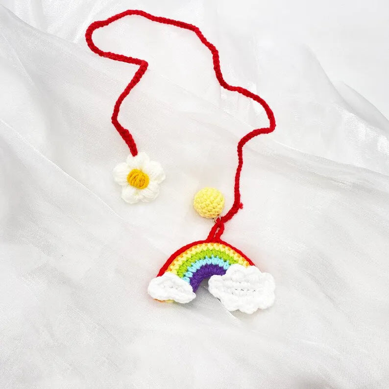 Handmade crocheted avocado rainbow flower car pendant in wool with cartoon styling