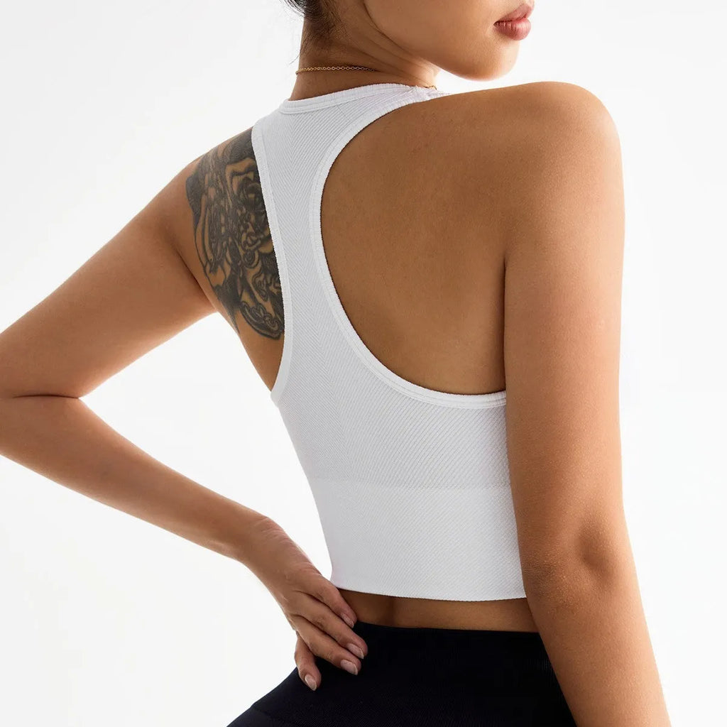 Black women's cross-back sports bra with fixed double straps and moulded cups.