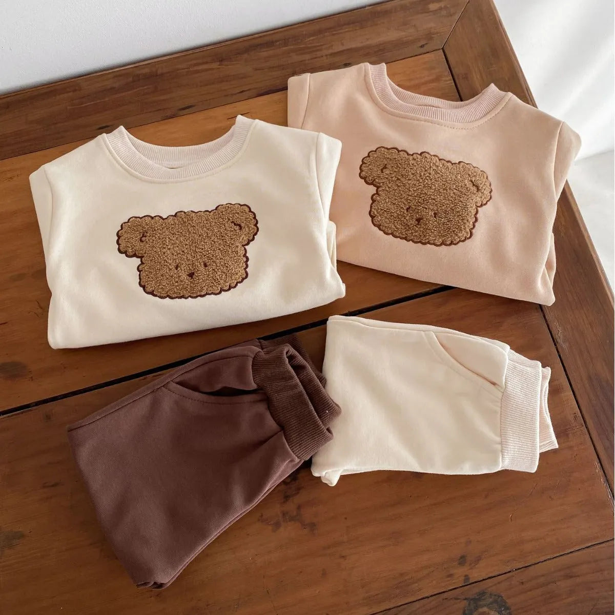 Bear long-sleeved cotton two-piece suit for babies in light beige with cartoon animal print