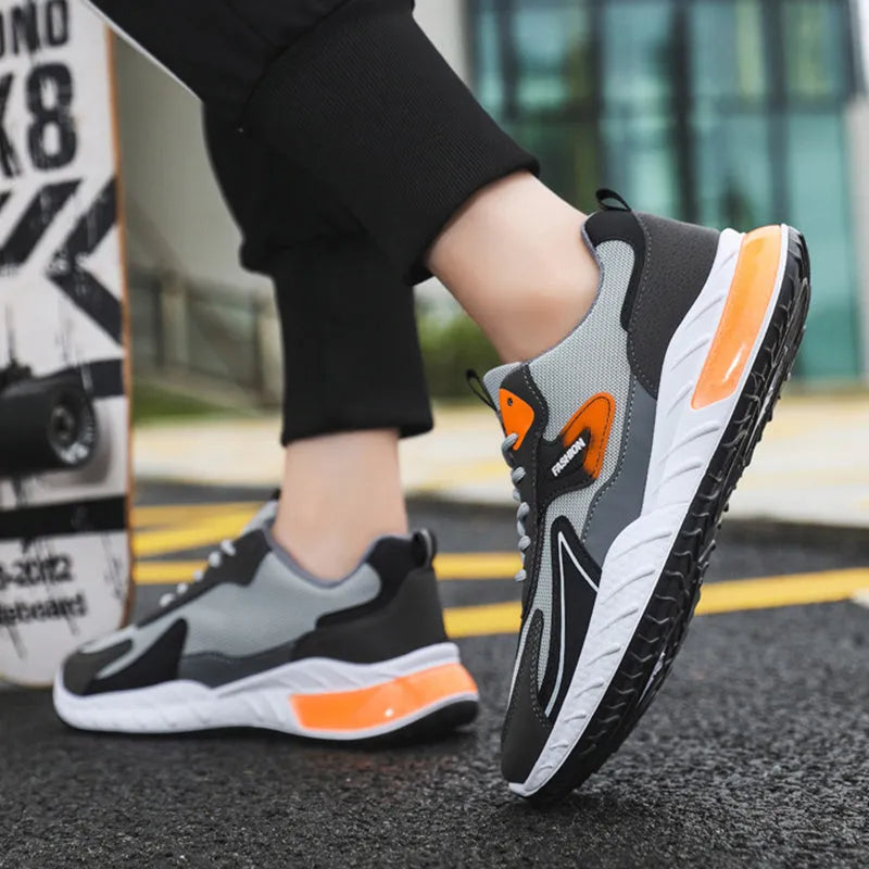 Colour-blocked men's mesh trainers with rubber sole, front lace-up, flat heel, round toe, in Black Green, Black Orange, or Grey Orange.