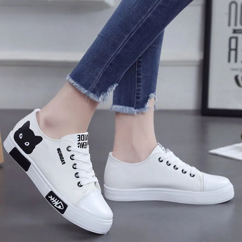 Cat fish canvas shoes with breathable canvas upper and lace-up closure, available in pink, black, and white