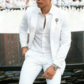 Men's white slim fit two-piece wedding suit with groomsman styling