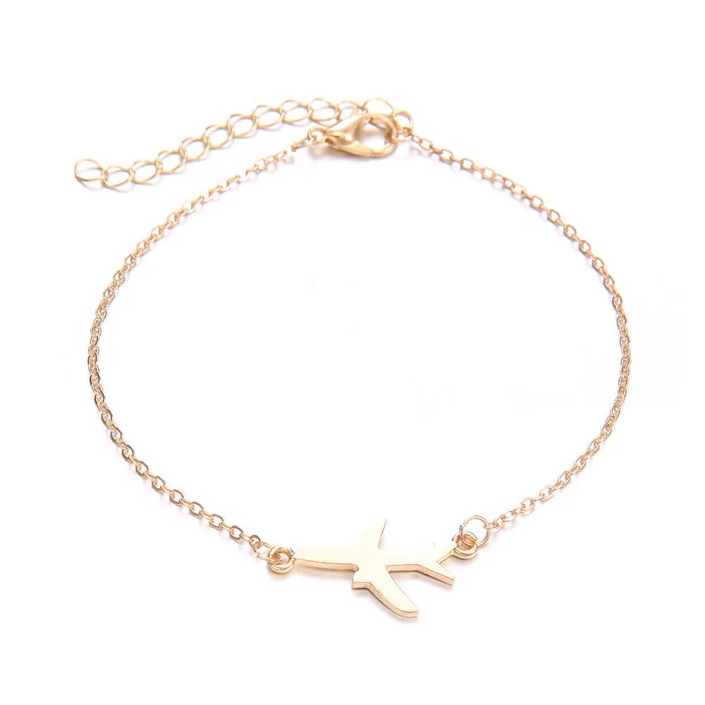 Three women's charm bracelets with heart-shaped aircraft map pendants in alloy with electroplated finish