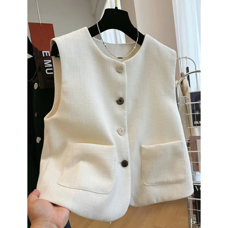 Women's sleeveless bandage dress vest in polyester with round neck, shown in milky white and black colours