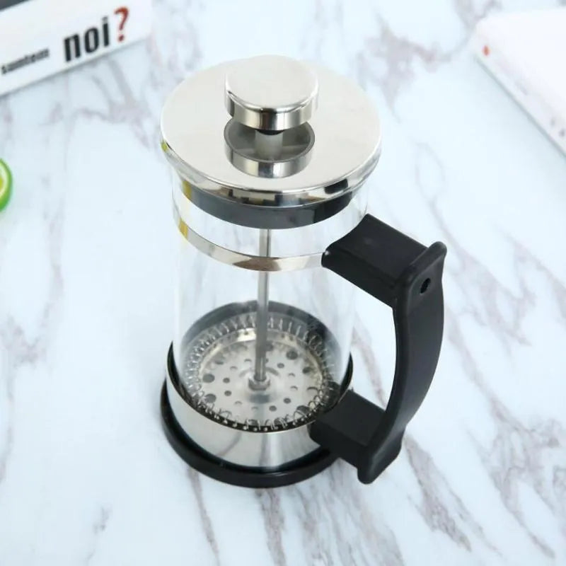 Glass and stainless steel coffee maker with 350ml capacity measuring 10x8x17cm