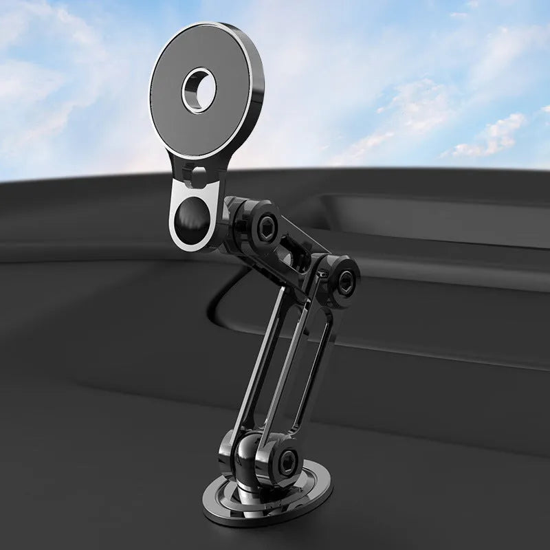 Black magnetic suction car phone holder on dashboard with mobile phone attached