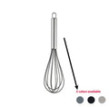 Silicone kitchen utensil set with twelve tools in a rotating white storage caddy on a counter.