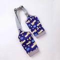 Blue dog knee protector with thick elbow pad and adjustable strap, shown with a matching scarf.