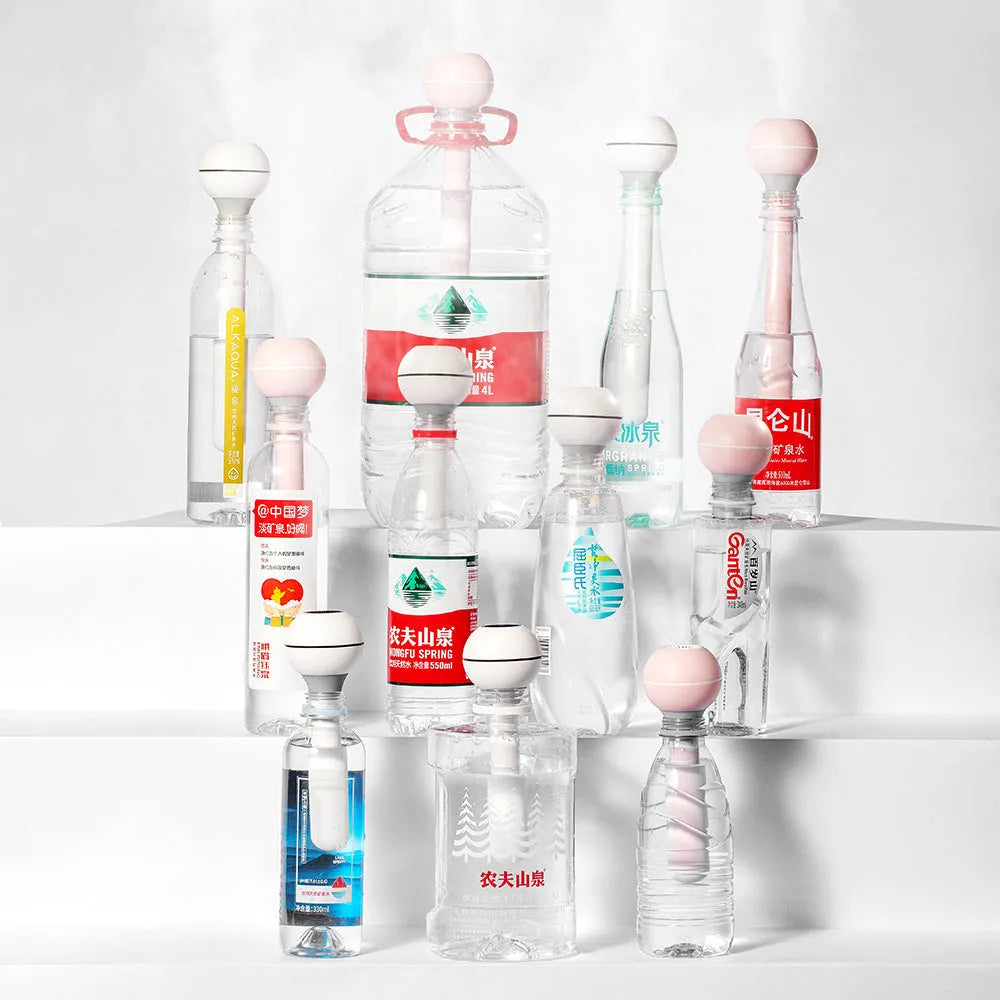 Magic wand ultrasonic humidifier with columnar design in pink or white colours