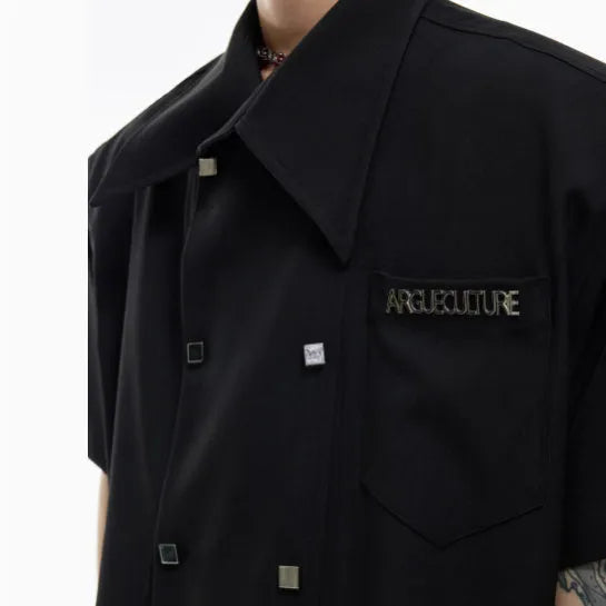 Men's loose-fit casual short-sleeved shirt with lapel collar and decorative splicing details, shown in blue.