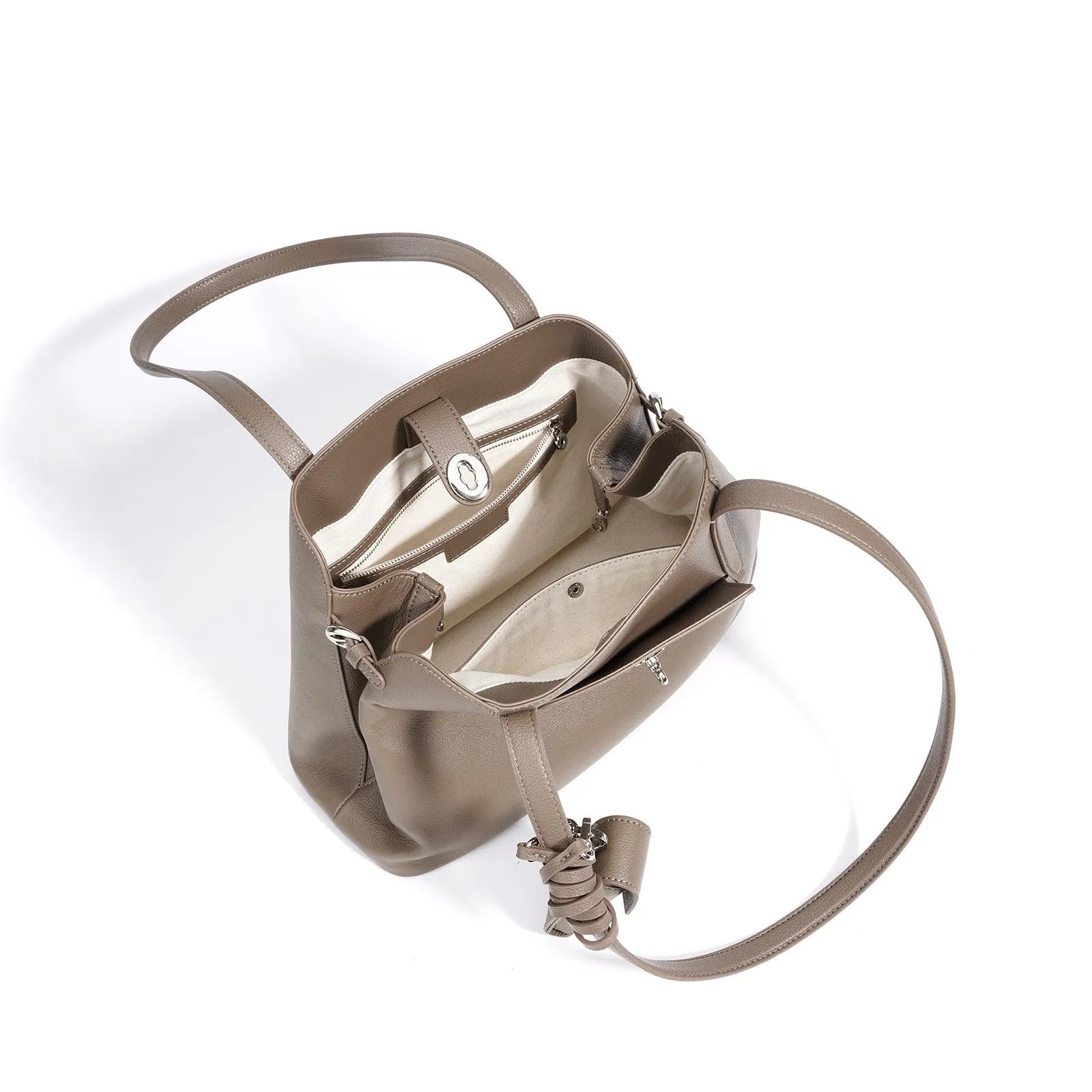 Large capacity genuine leather bucket bag for women in black with crossbody strap and patchwork detail