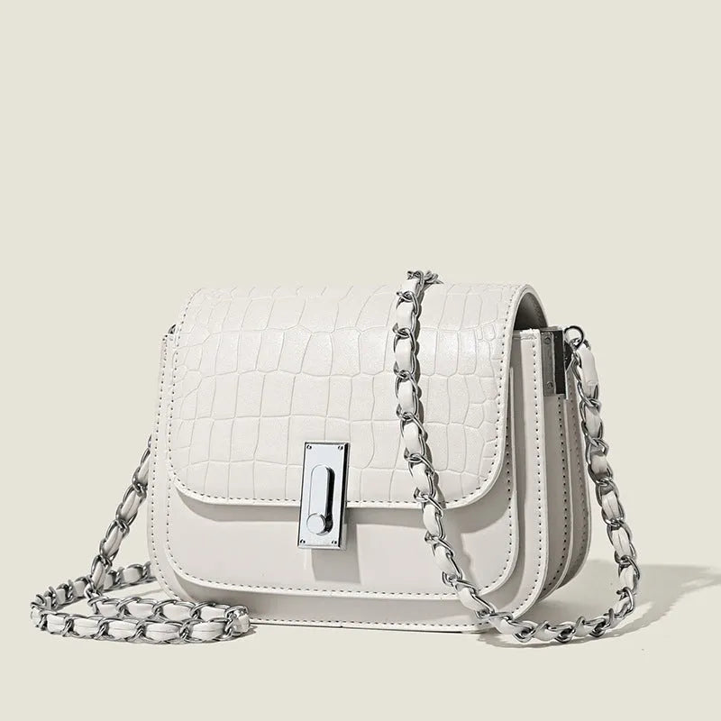Women's black soft PU chain shoulder bag with square shape and cross-body strap.