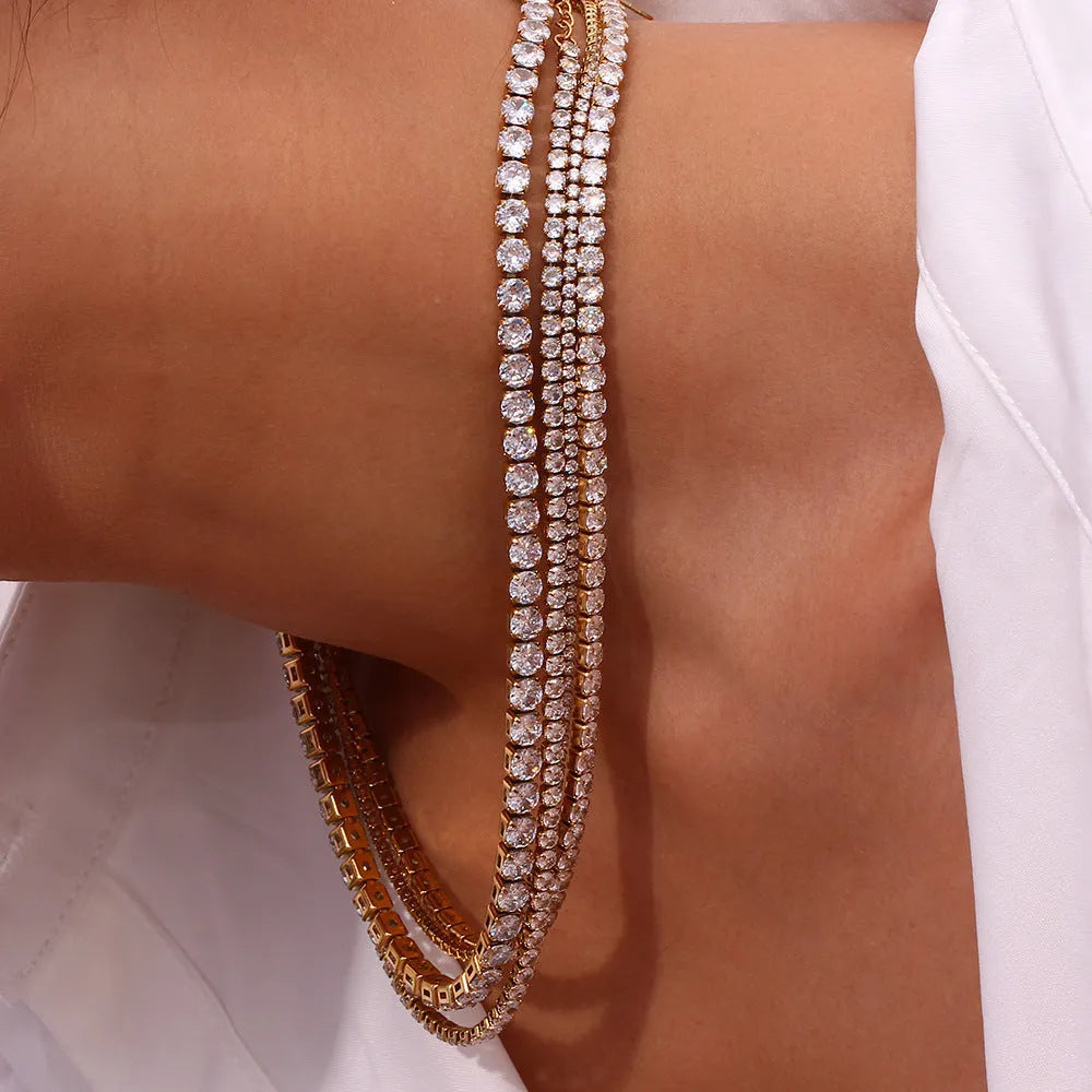 Stainless steel zircon necklace and bracelet set with 2-5mm stones and gold or silver titanium steel pendant