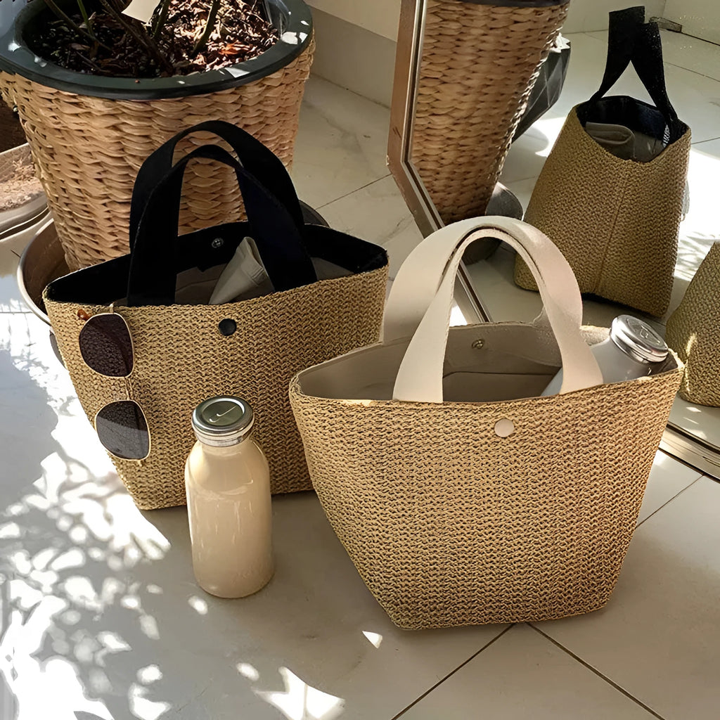 Casual rattan straw shoulder bag in black, bucket shape with shoulder strap
