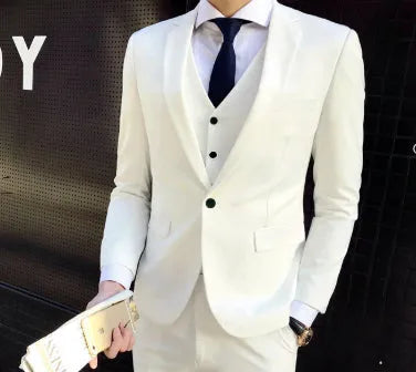 Men's white slim fit cotton blend suit set with jacket, vest, and trousers on a hanger