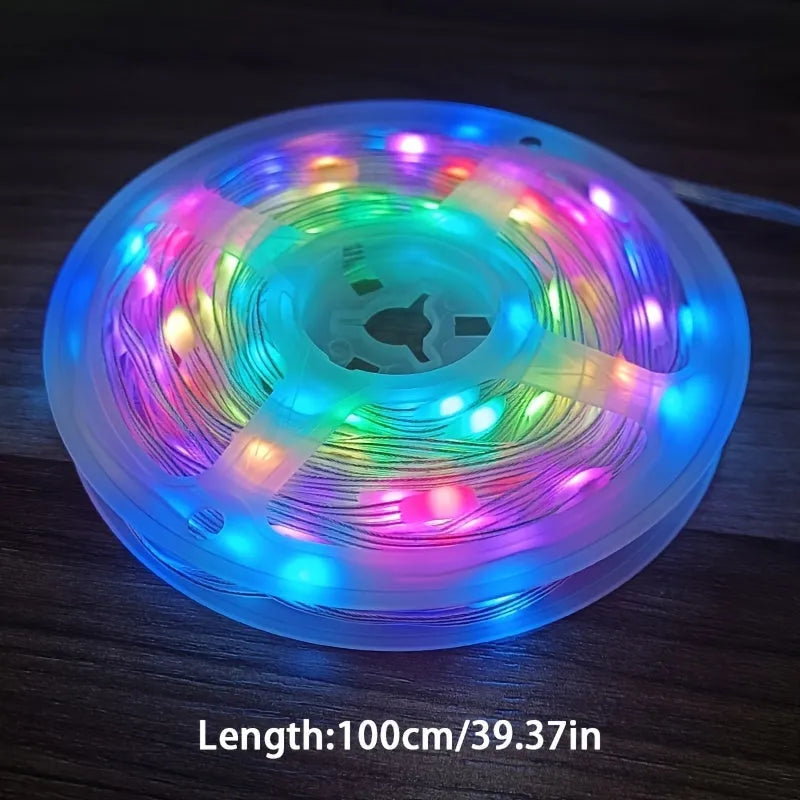 Long 10-metre multi-colour LED party light string with 100 lights coiled on a reel.