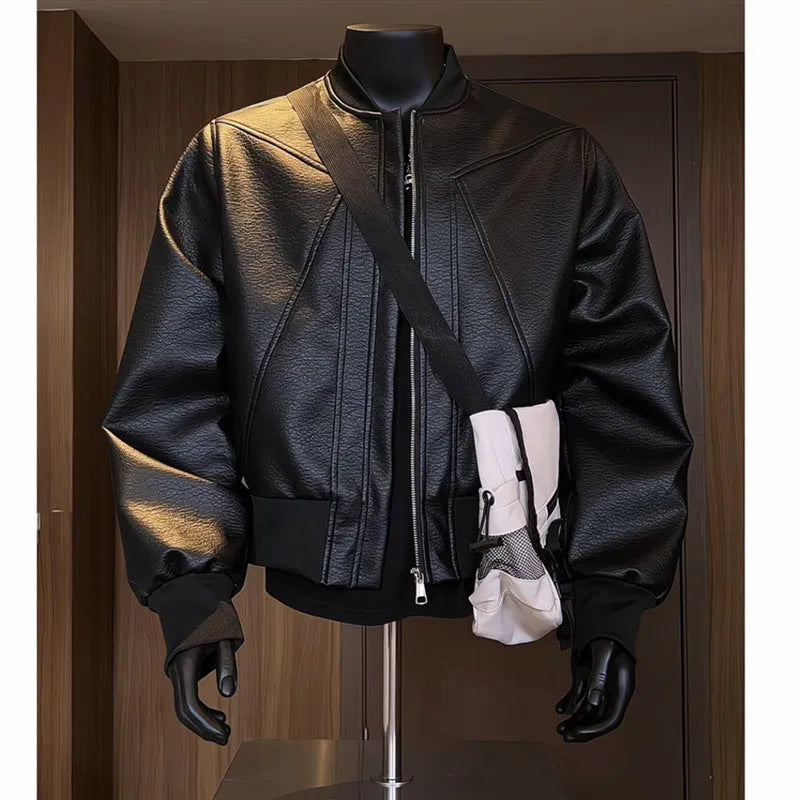 Men's black PU leather motorcycle-style jacket with an extended length and tight fit on a hanger.