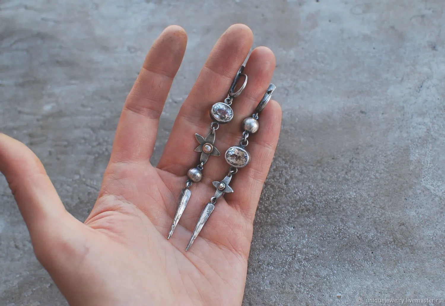 Geometric pendant drop earrings with antique silver finish and rhinestone detailing