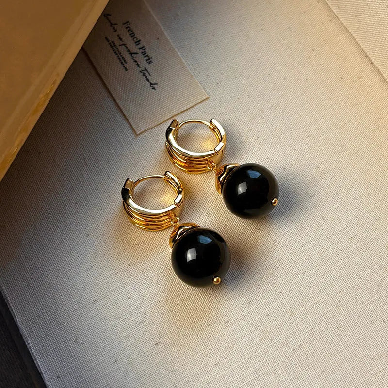 Gold-plated tigereye stone earrings with geometric round shape in French retro style