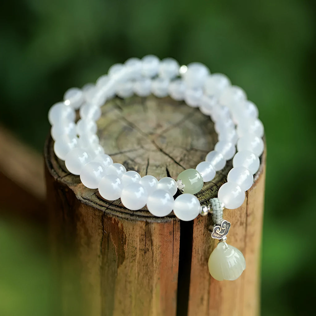 White agate and Hetian jade beads on a geometric S925 sterling silver lotus bracelet for women.