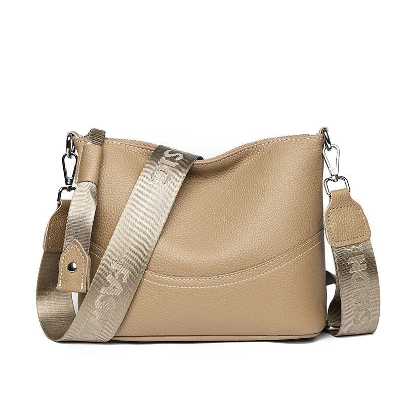 Genuine leather horizontal square crossbody bag with inner patch pocket, available in black, brown and khaki