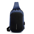 Dark blue Oxford cloth chest bag with a zip and adjustable strap, shown with a phone in its dedicated internal pocket.