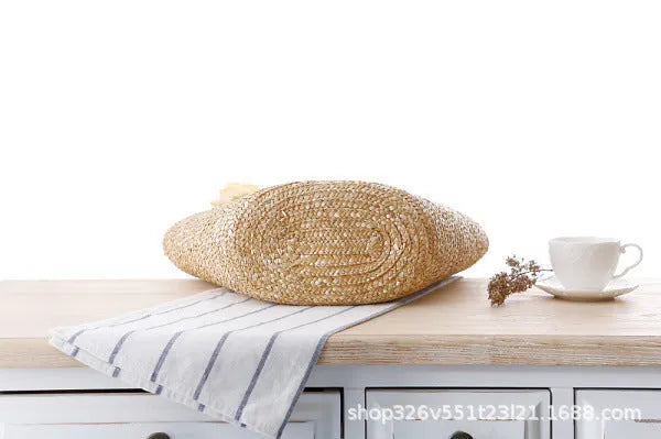 Natural primary colour woven straw bag beach bag handbag with shoulder straps on white background