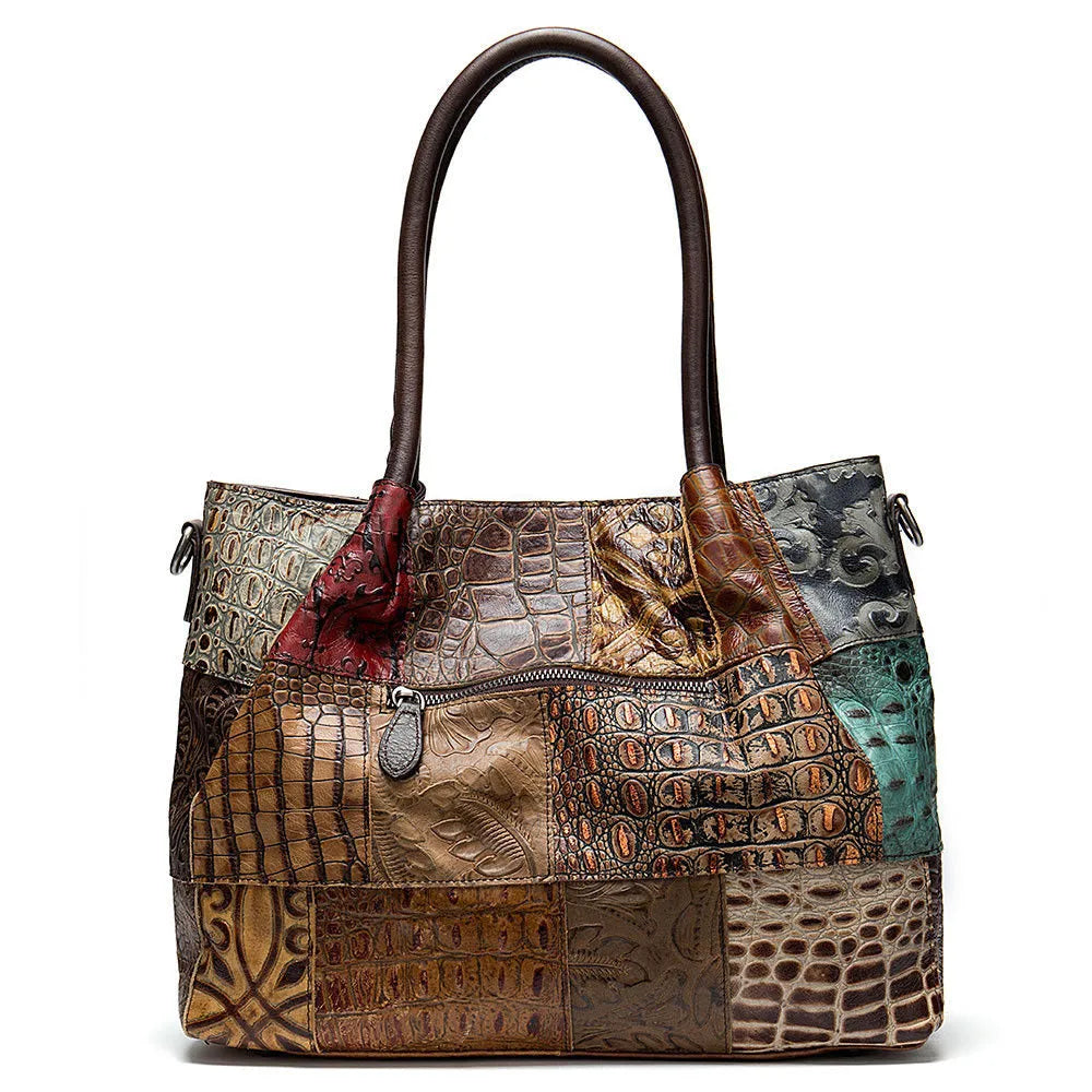 Women top layer cowhide medium handbag with contrast geometric embossing, soft handle, and open-top design