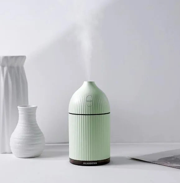 White 300ml USB ultrasonic aromatherapy diffuser with LED light measuring 80x80x155mm