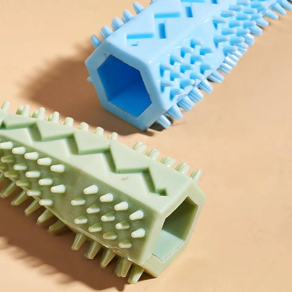 Blue TPR dog chew toy with hexagon shape and serrated surface for teeth cleaning