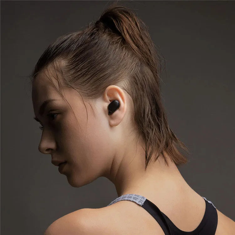 Redmi AirDots 2 black true wireless earbuds and charging case.