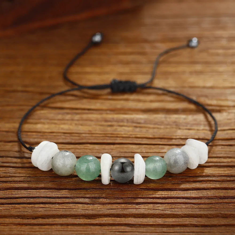 A geometric stone beaded bracelet for women on a wrist, shown in Colour 3906.