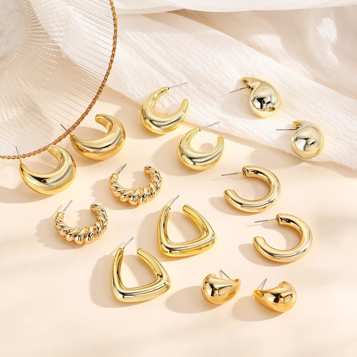 Acrylic geometric water drop earrings with electroplated glossy finish, simple style