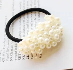 Cloth beaded hair rope in black colour on a white background